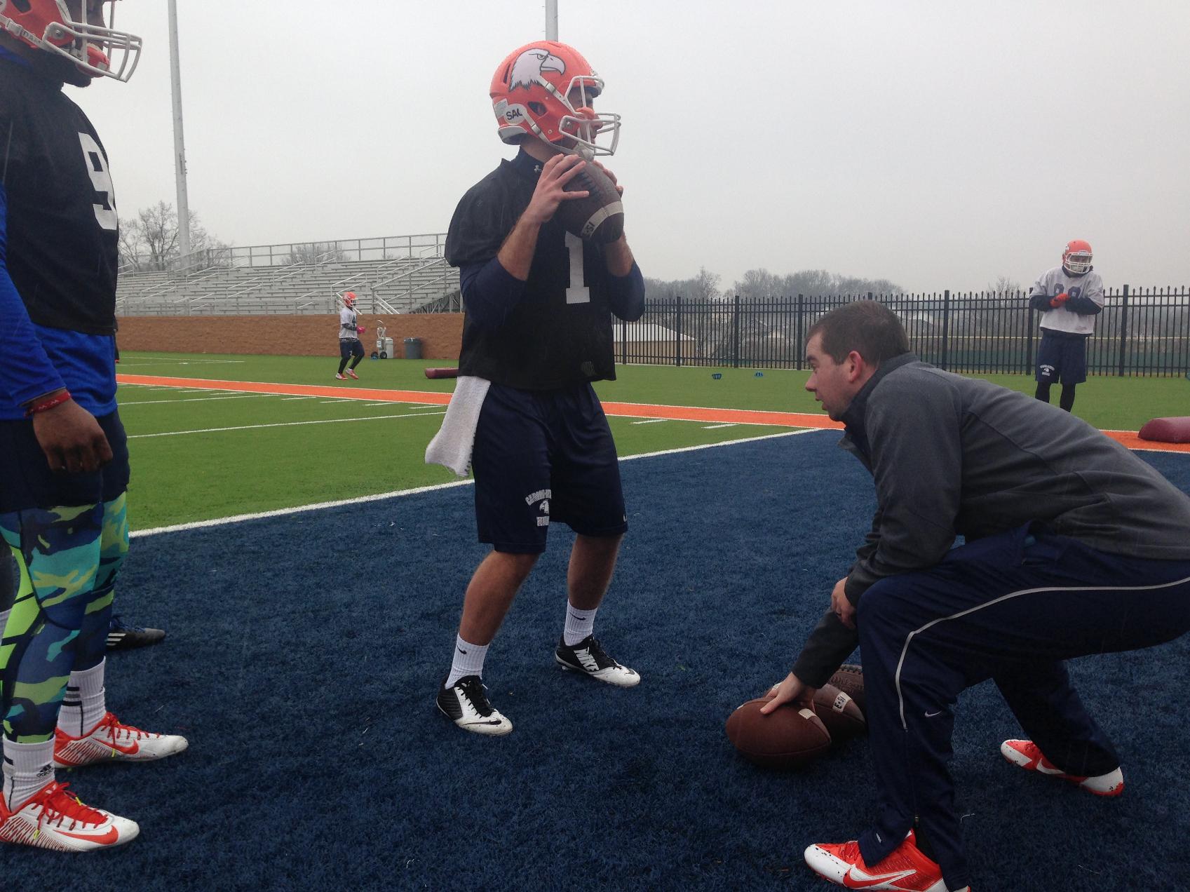 Eagles open 2016 spring practice in sleet and rain