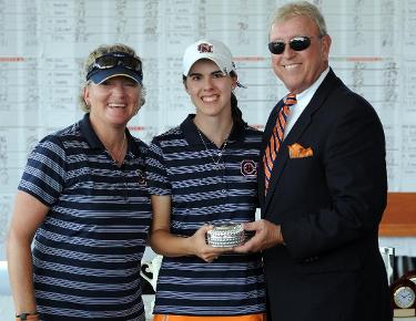 C-N head women's golf coach Suzanne Strudwick (left) and C-N director of athletics Allen Morgan (right) pose with women's golfer Meridith Hawkins (center) after she earned a spot on the Smokey Mountain Intercollegiate All-Tournament team
