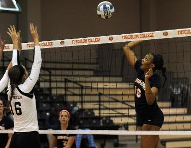 Eagles shoot through Trojans in four-set victory