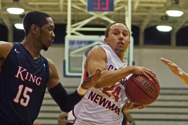 Short-handed Eagles fall to hot-shooting King, 79-71