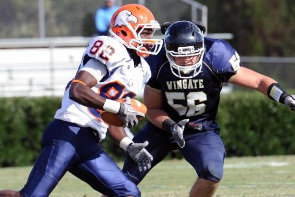 Eagles fall to Wingate on Saturday, 33-21