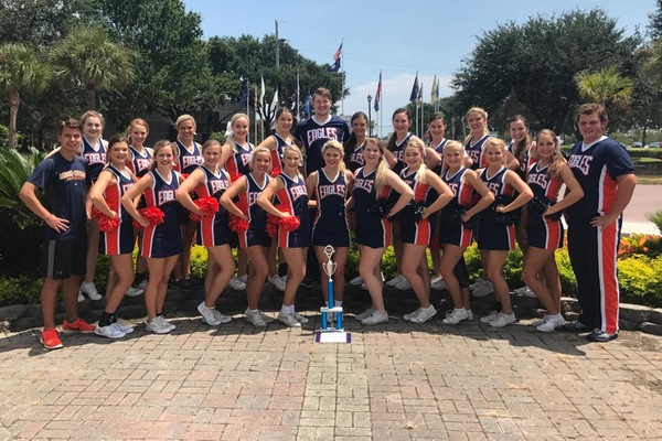 Cheer brings home two first-place trophies from NCA Cheer Camp